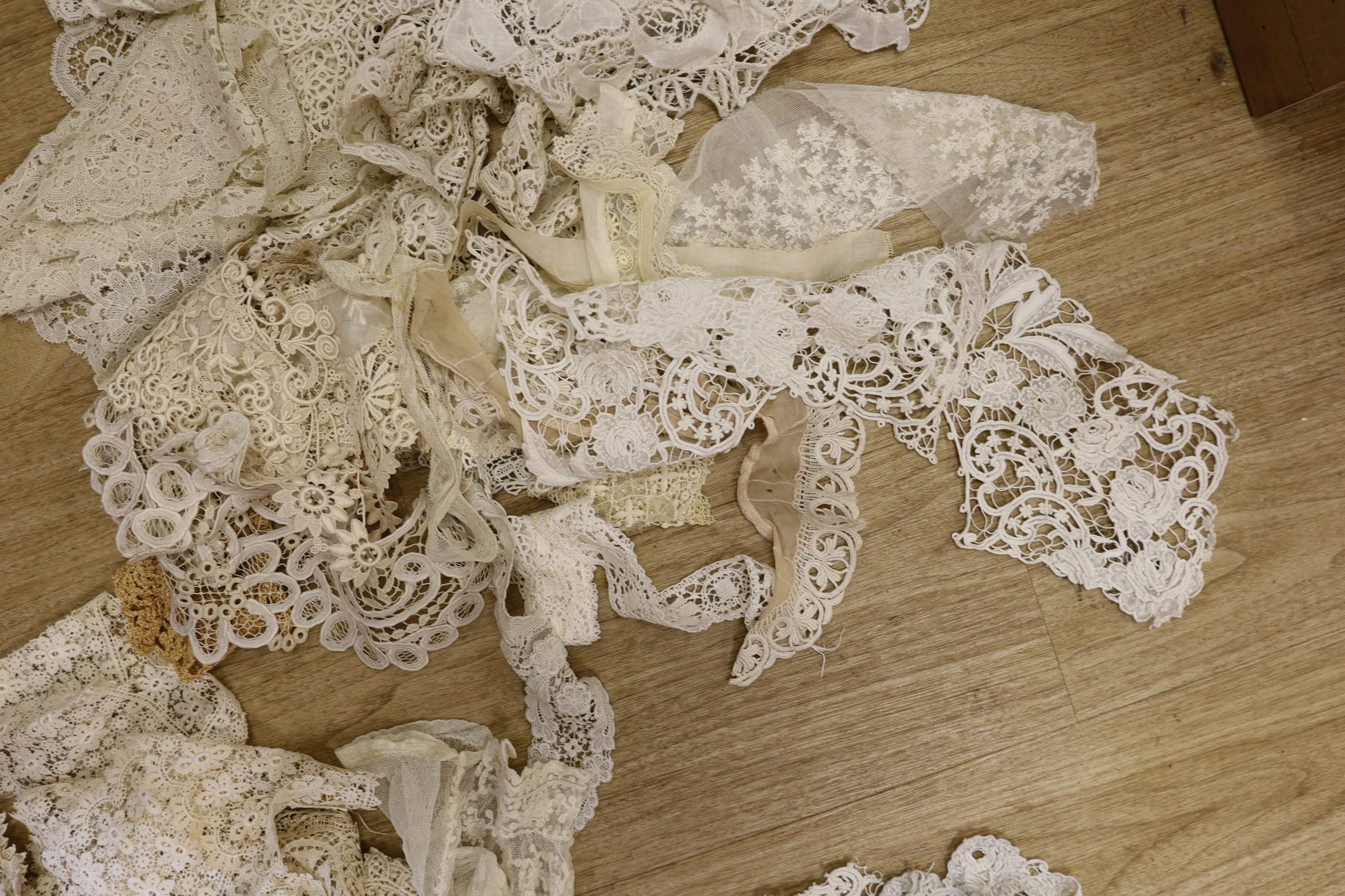 A collection of chemical lace collars, mostly 20th century, and other machine lace